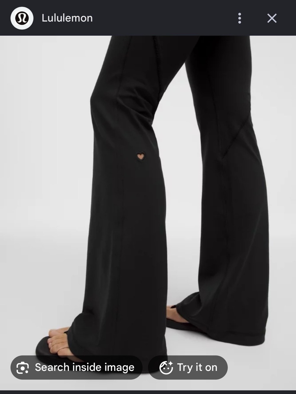 lululemon flare pant heart cutout with matching pink heart bar. Size Medium